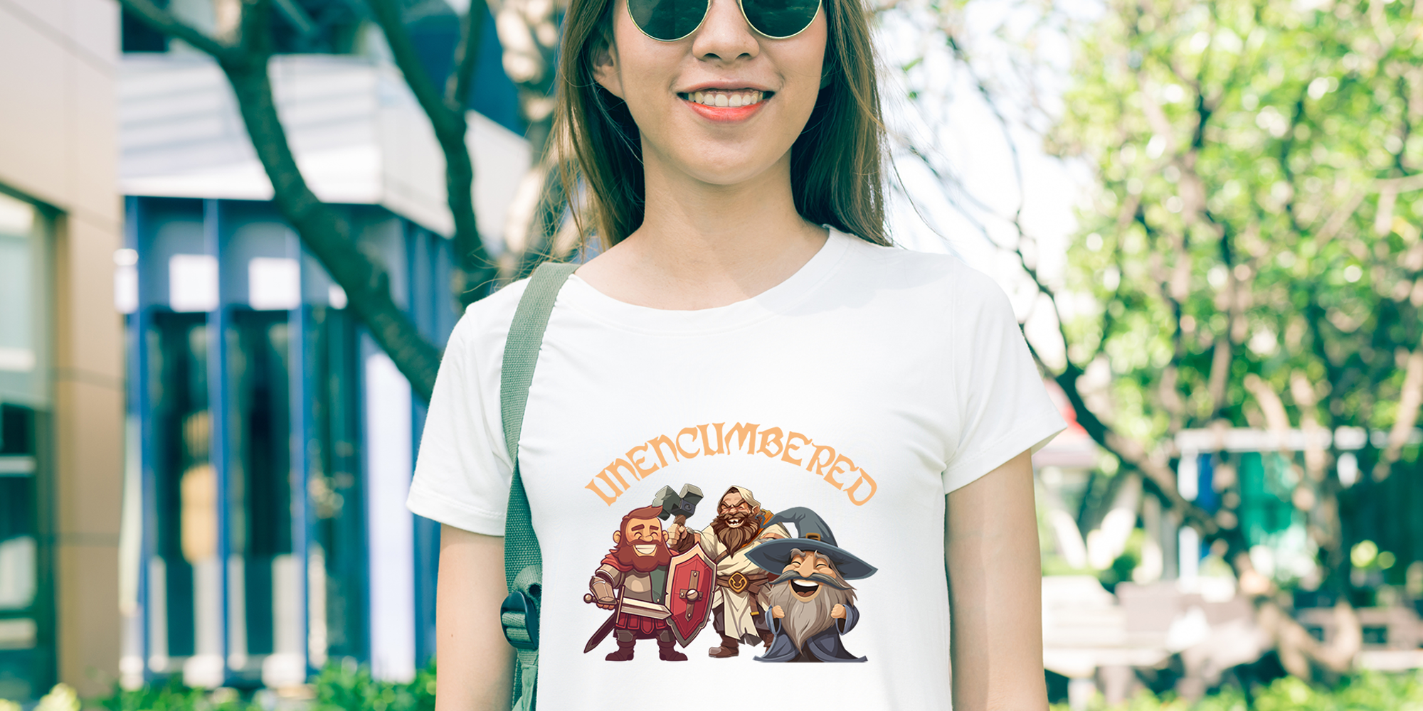 Woman outdoors in short-sleeved white t-shirt with a TTRPG-themed saying and artwork.